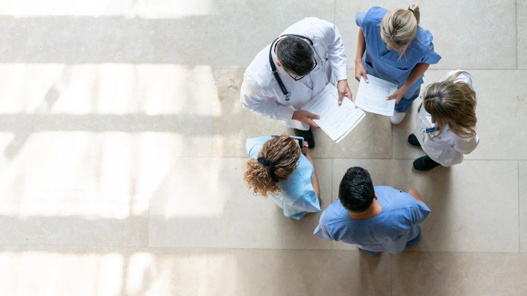 Healthcare professionals in a meeting (iStock)